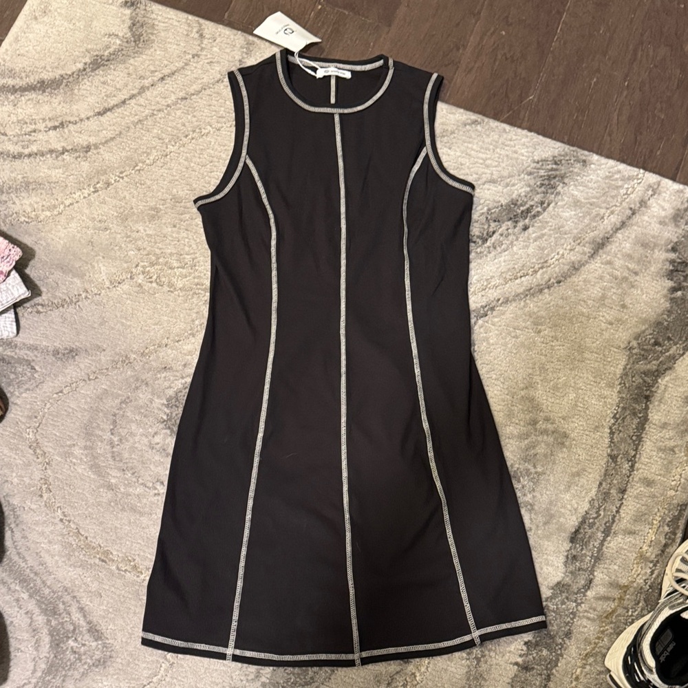 Chic Black Sleeveless Dress with White Trim